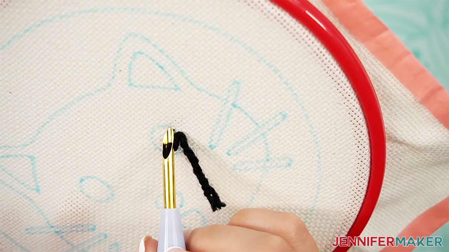 Start the second stitch of the punch needle design close to the first stitch.