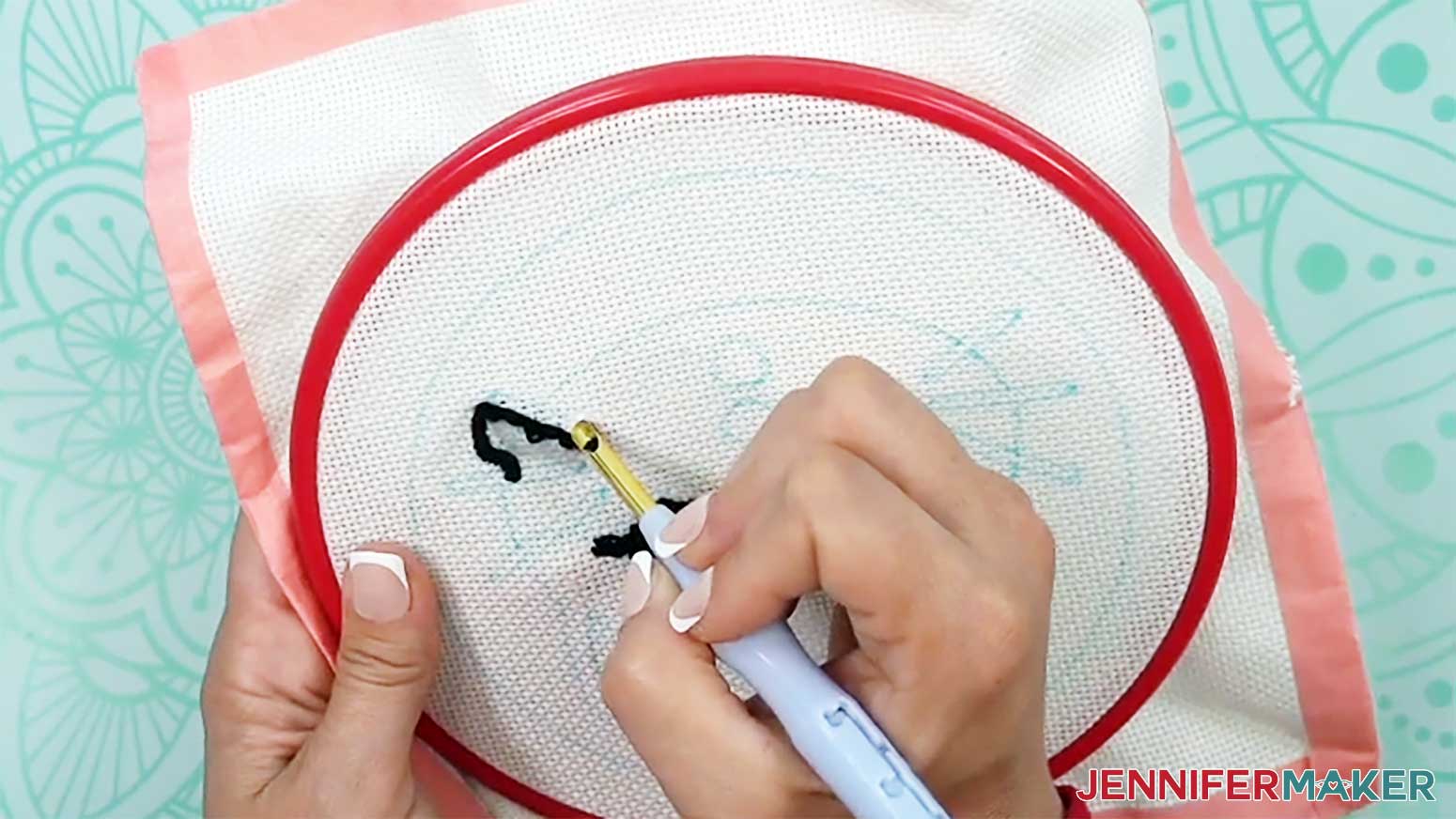 Follow the outline of the whisker with the punch needle when stitching the punch needle design.