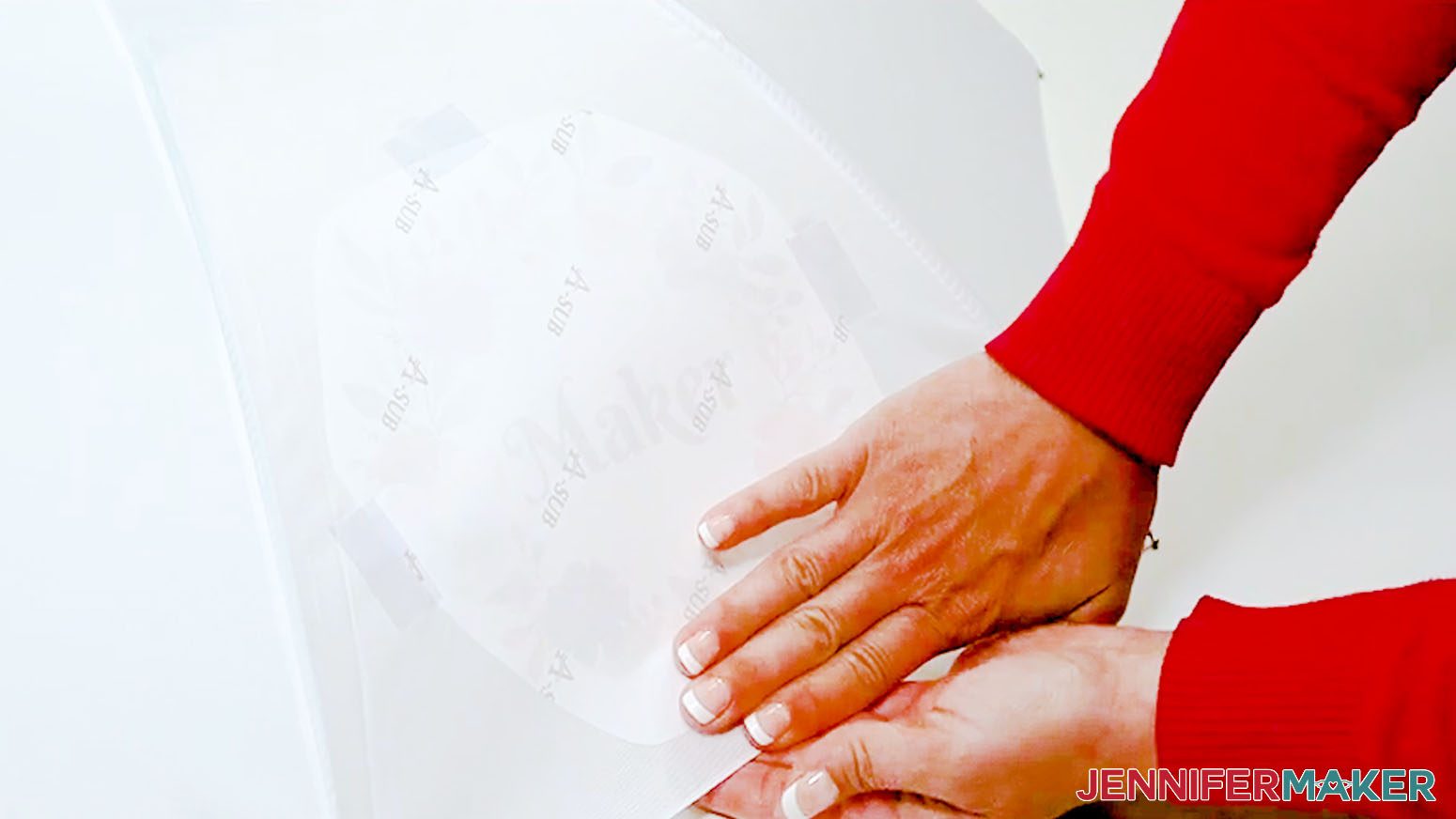 Use both hands to press the heat resistant tape from either side of the sublimation umbrella.
