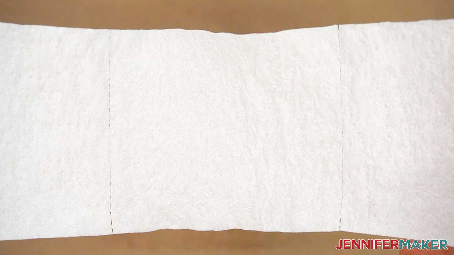 Allow the sprayed toilet paper square to dry completely prior to pressing the toilet paper sublimation design.