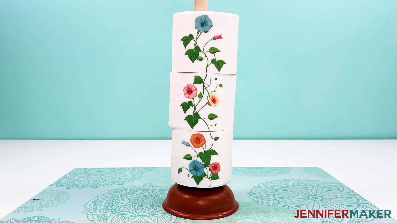 Stack the sublimation toilet paper rolls on a plunger for display.