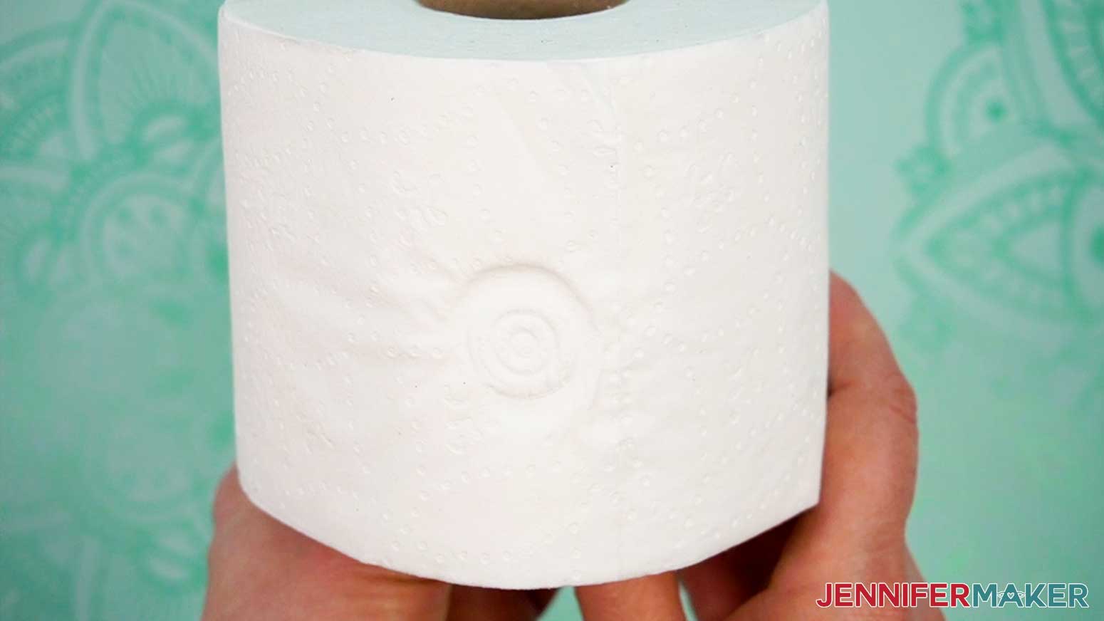 Press the toilet paper roll closed with a water stamp.