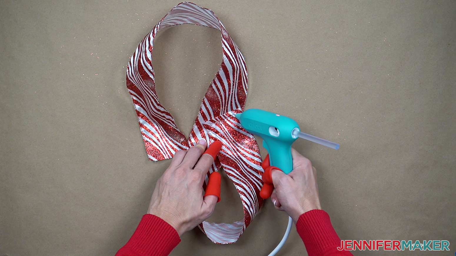 Use hot glue to connect the ends of the ribbon.