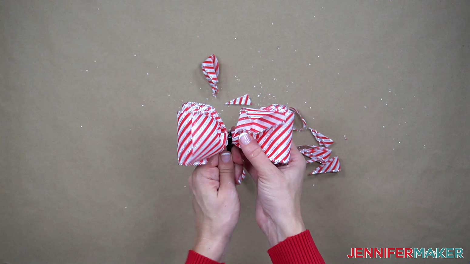 Use a zip tie to hold all the layers of the pom pom bow together in the middle.