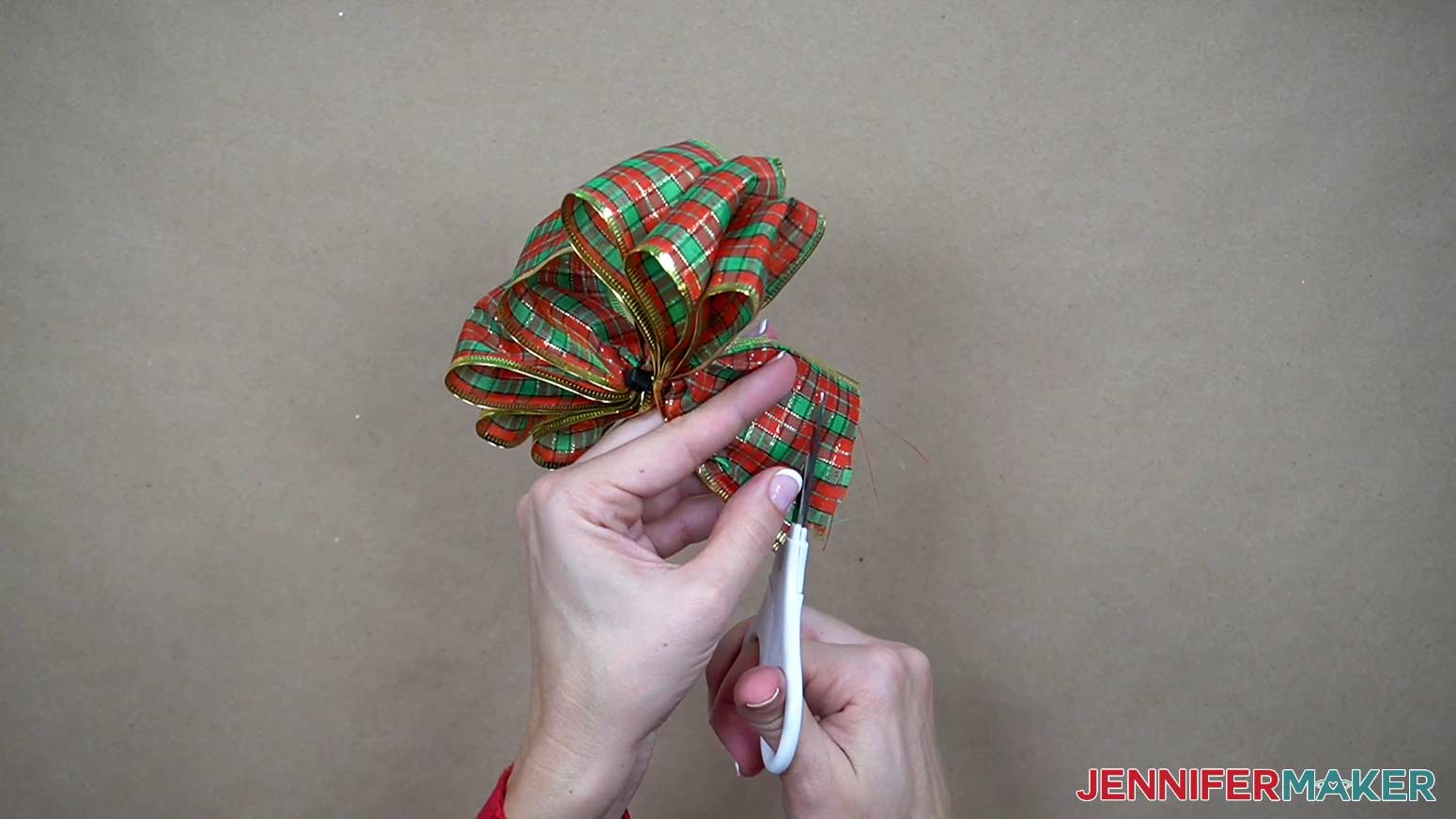 Trim the ends of the ribbons to match each other.