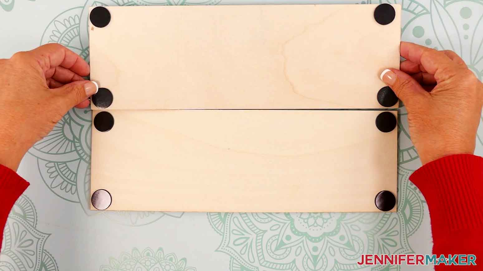 The magnets are attached for the base and top wood panels.