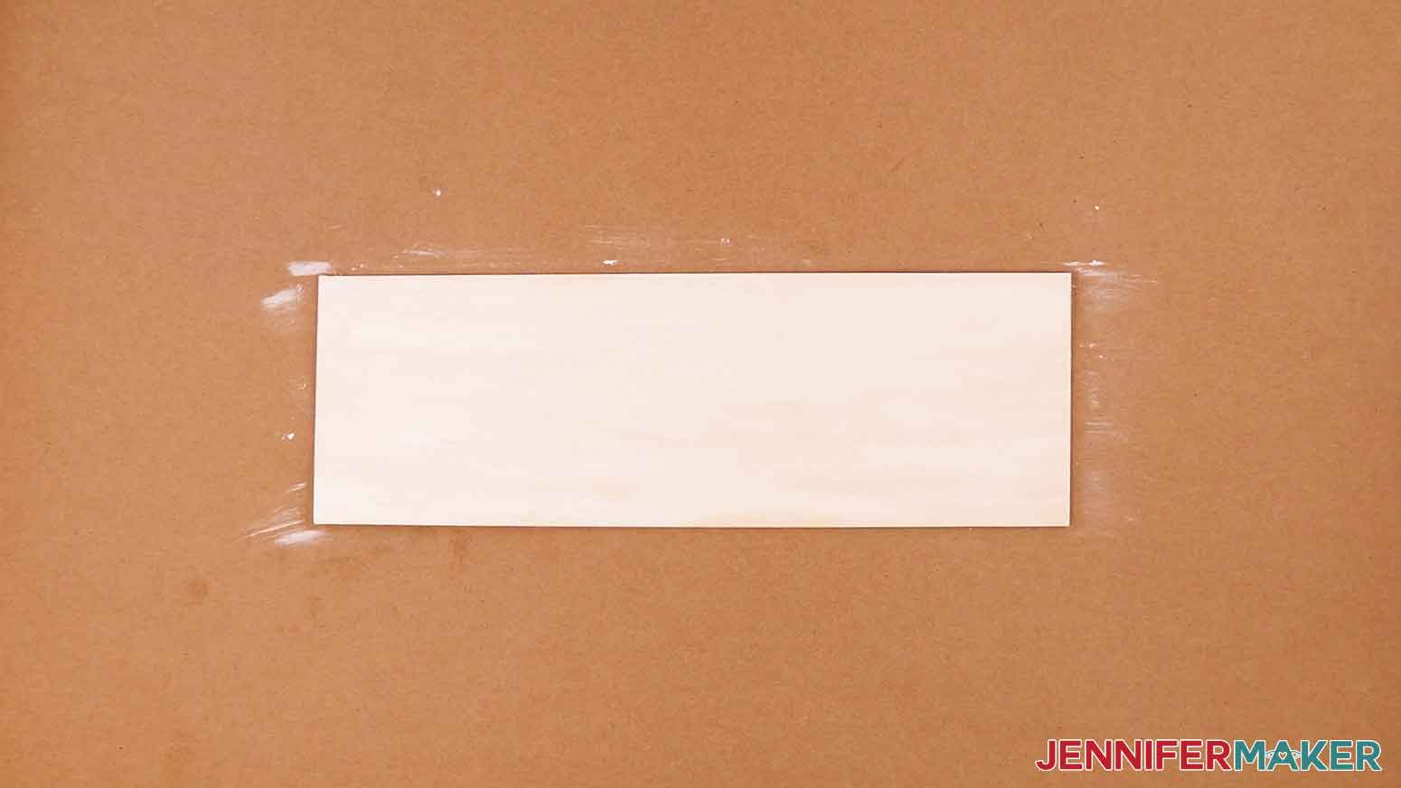 Wood panel with white faux stain chalk paint.