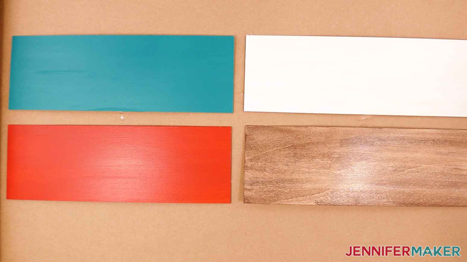 All four finished wood panels sealed and ready for vinyl decorations.