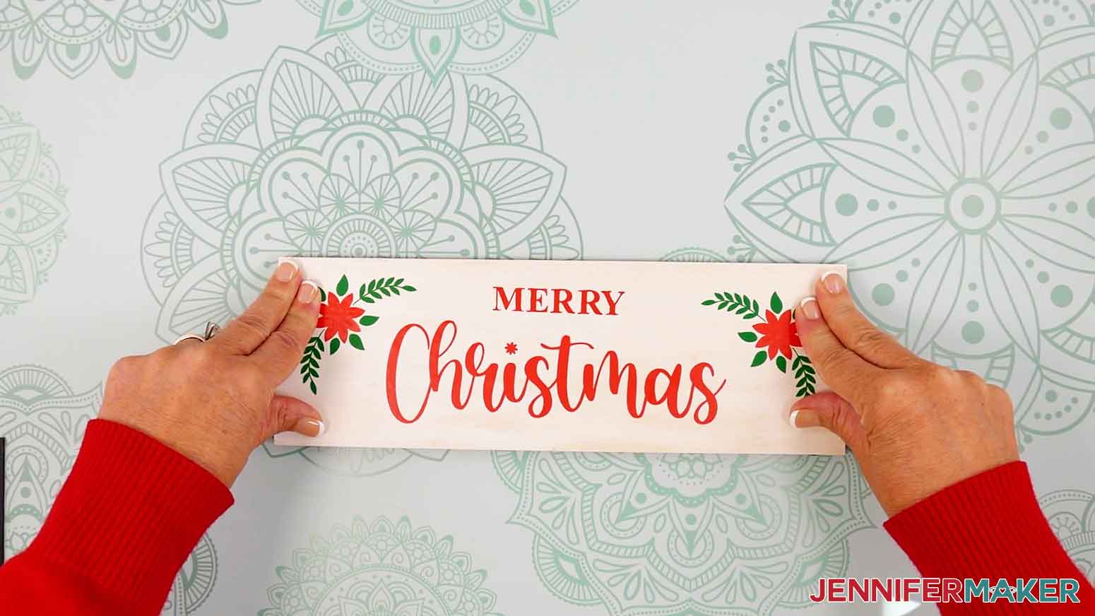 Press the decorative panel onto the backing panel to adhere the magets in the correct placement.