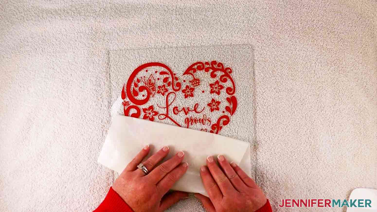 Removing transfer paper from intricate hearts decal