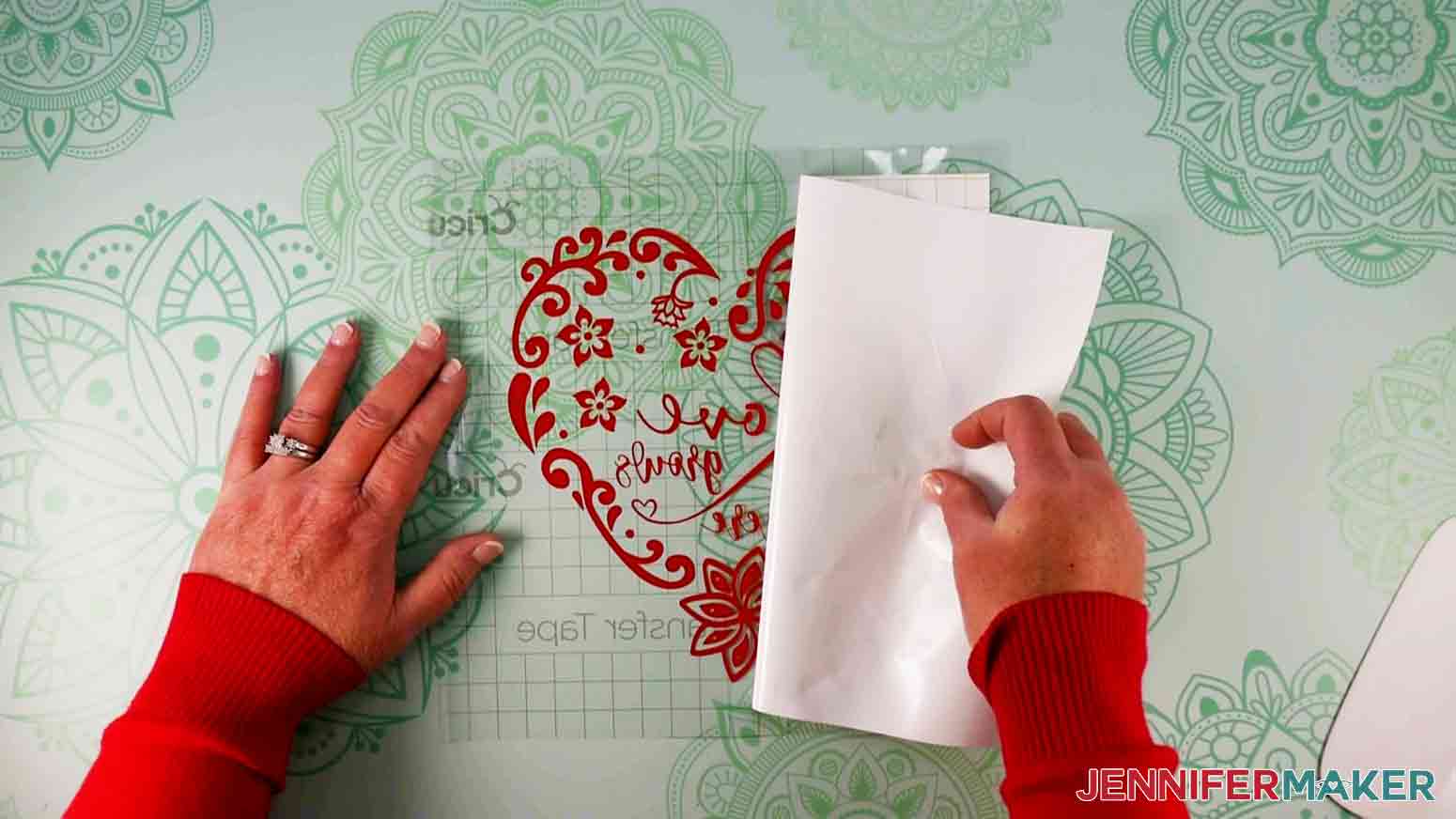 Removing transfer tape backing from intricate hearts decal