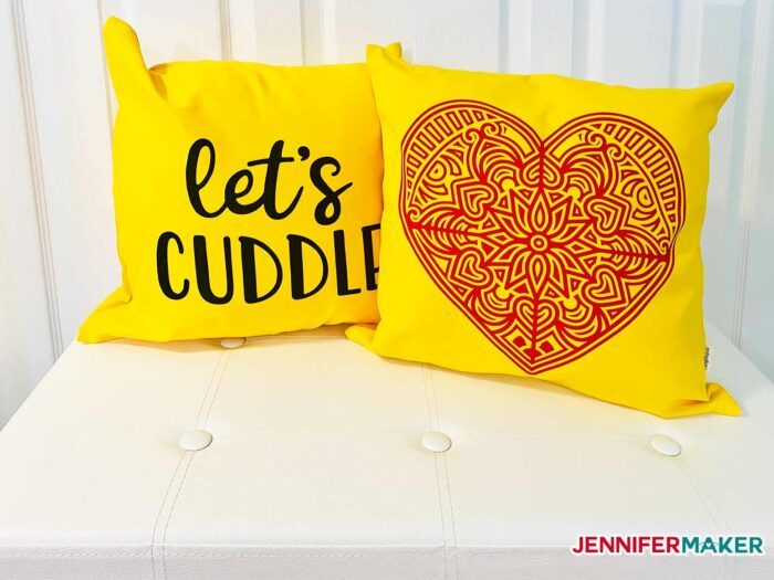 Yellow throw pillows with blank and red iron on vinyl cut with a Cricut Explore 3
