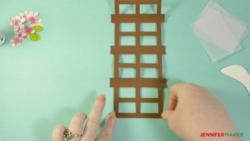 Folding the Japanese paper lantern on the score lines