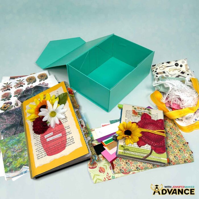 Learn how to Make Junk Journals and a junk journal ephemera box with JenniferMaker's tutorials. A junk journal ephemera box sits open on a surface, with paper scraps and ephemera scattered around it
