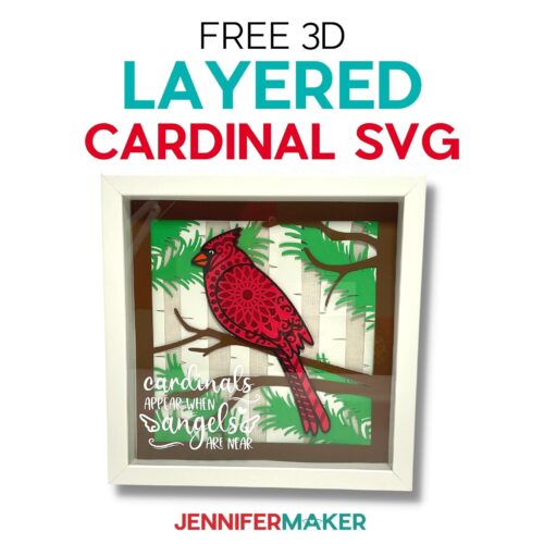 Cardstock layered cardinal SVG project in a white shadow box frame.