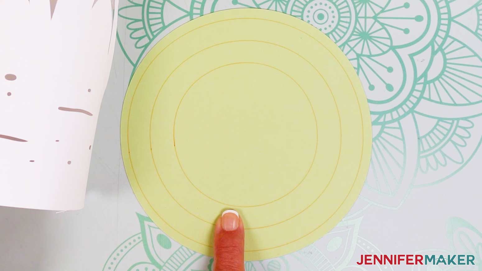The drawn circles on the base are a guide for each of the lantern layers.