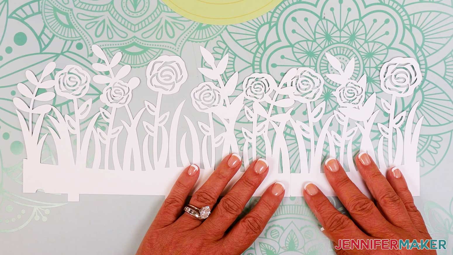 Press the glued edges together to adhere them evenly while the glue dries.