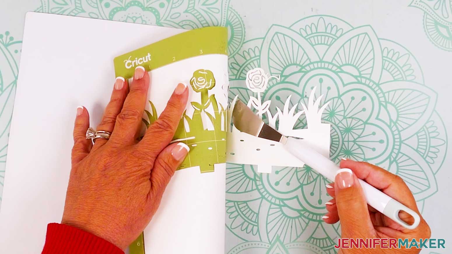 Use a spatula tool to help remove the delicate cut pieces from the machine mat.