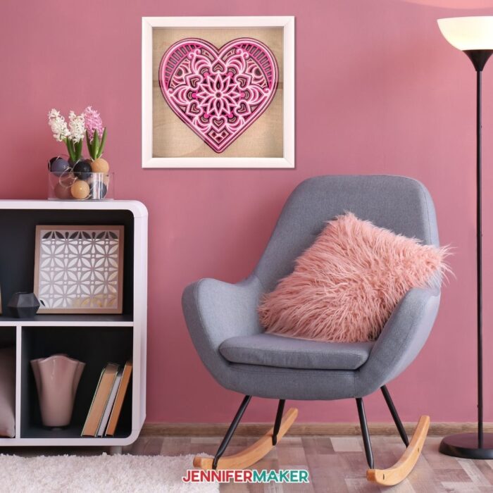 Layered mandala heart on a pretty pink wall