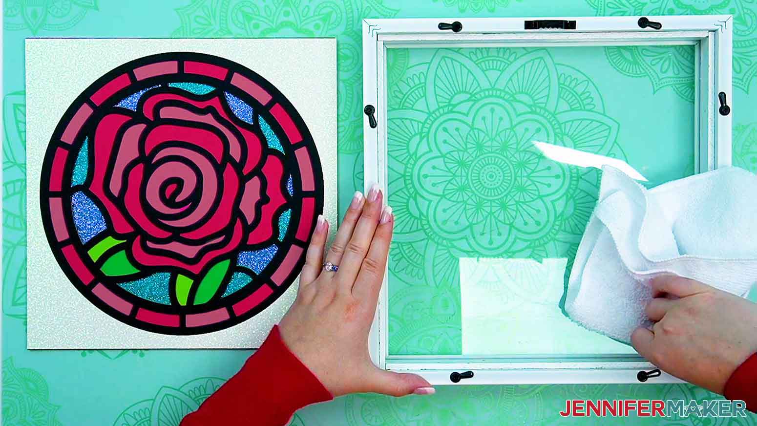 Use a cloth to clean the glass before adding the design to the frame.