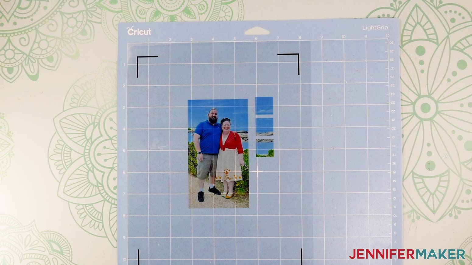 Printed photo of Jennifer and Greg for the light painting shadow box project correctly positioned on a blue LightGrip machine mat