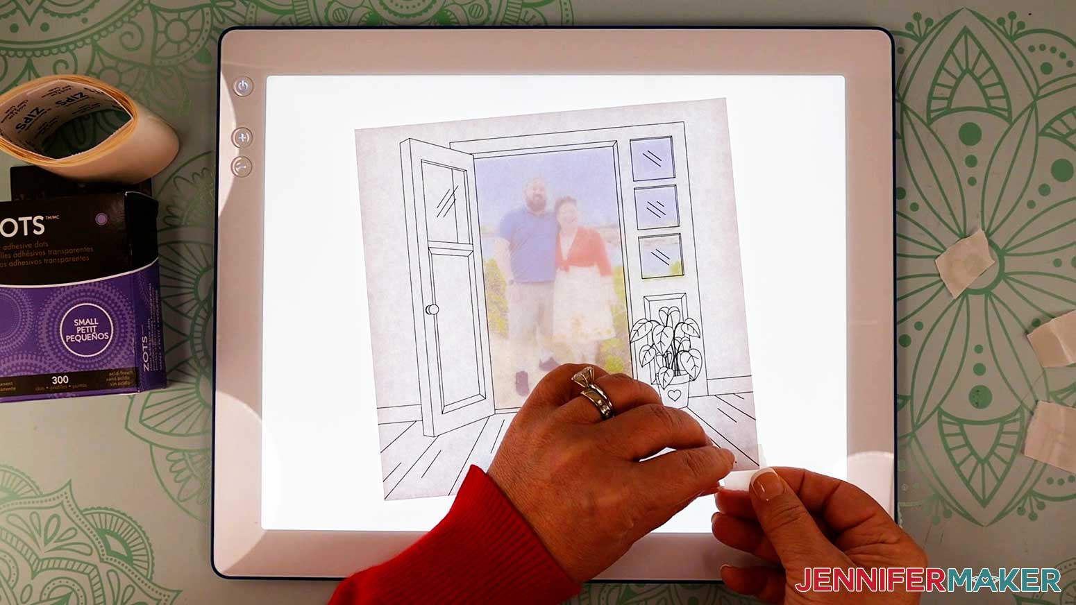 Add small glue dots in each corner on the back of the light painting shadow box drawing layer in order to attach it to the photo layer