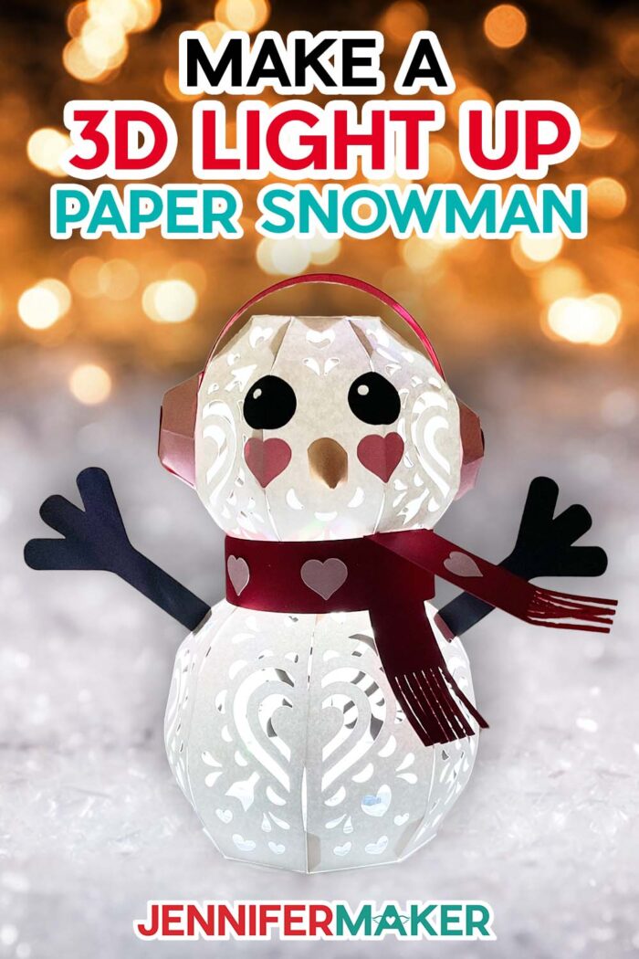Pinterest link for light up snowman made of cardstock with earmuffs, a scarf, and cute facial details and heart design cutouts.
