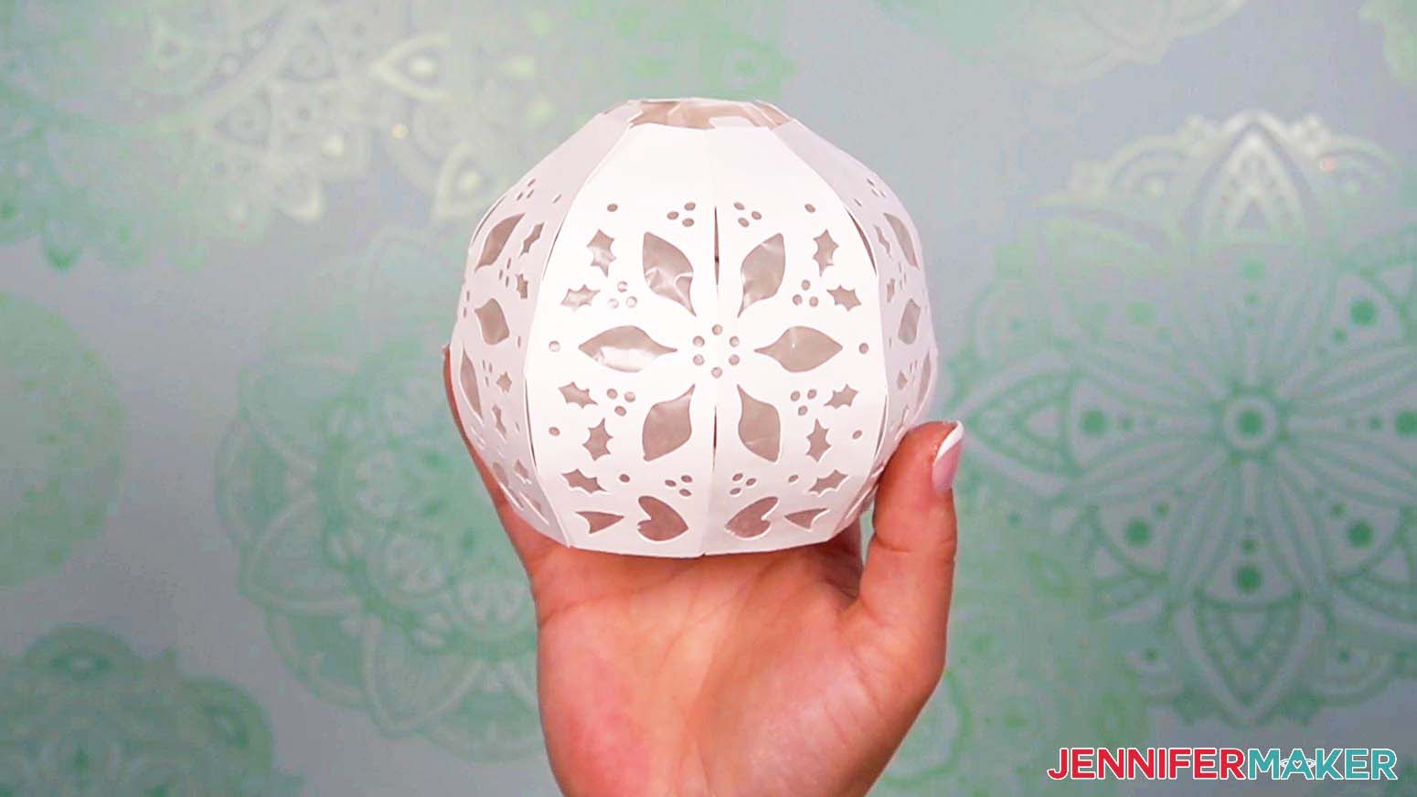 Once all the tabs are attached, the light up snowman's body pieces will form a sphere shape