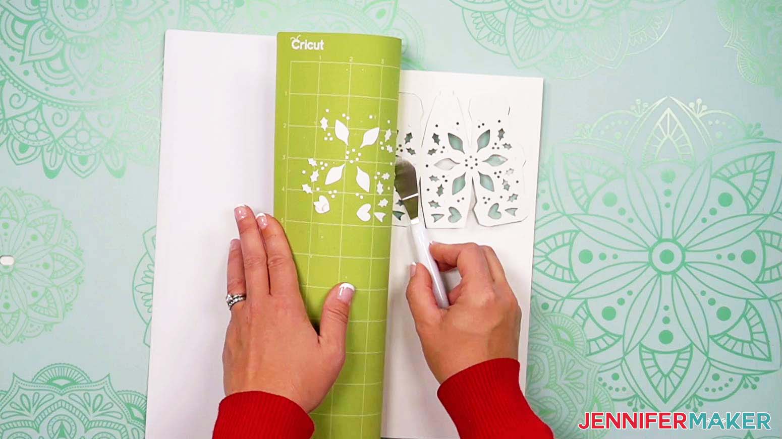 Remove the light up snowman cut pieces from your mat, using a spatula to help remove intricate pieces