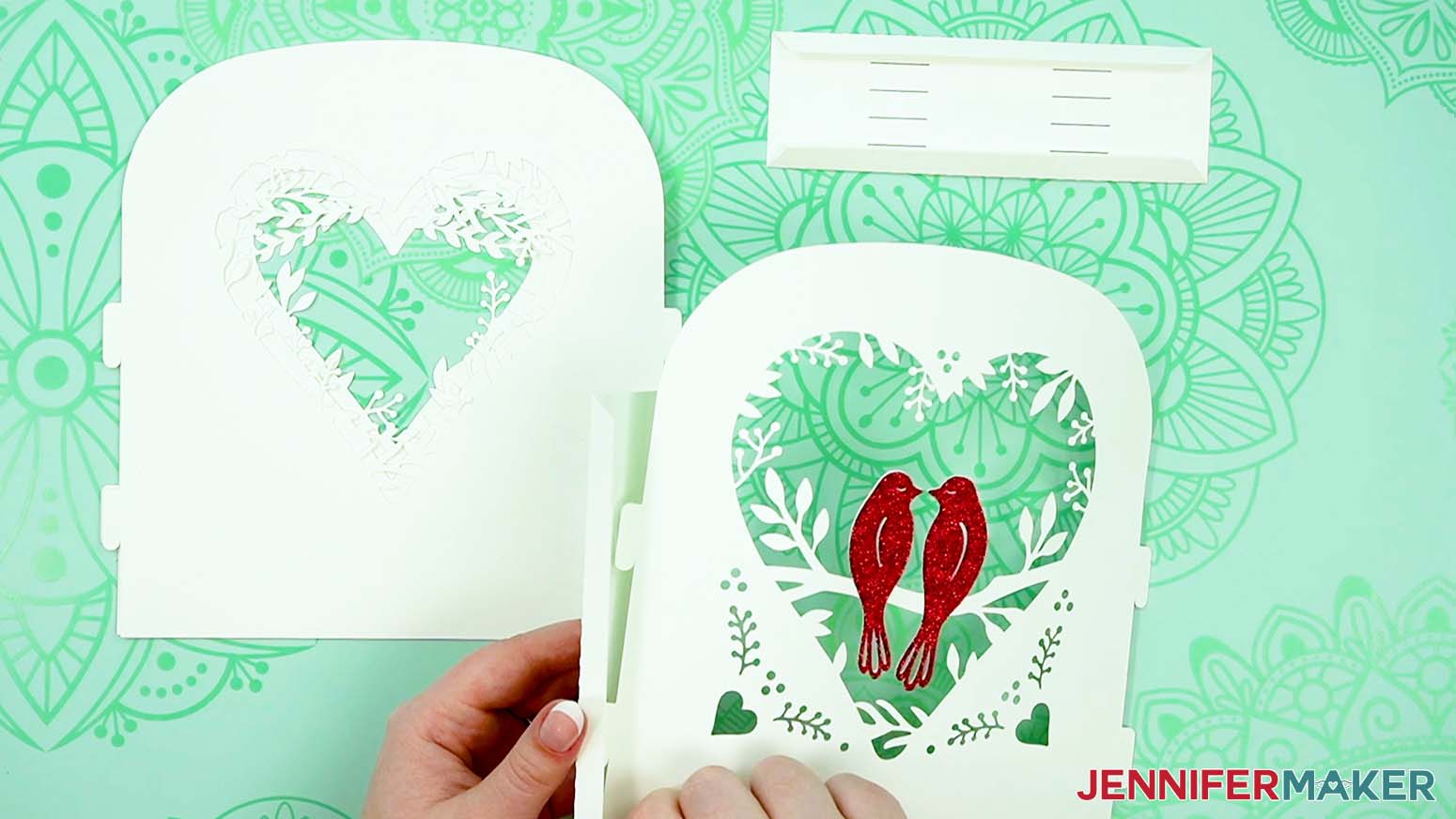Face the folded tabs on the side pieces toward the frame to make a love paper lantern