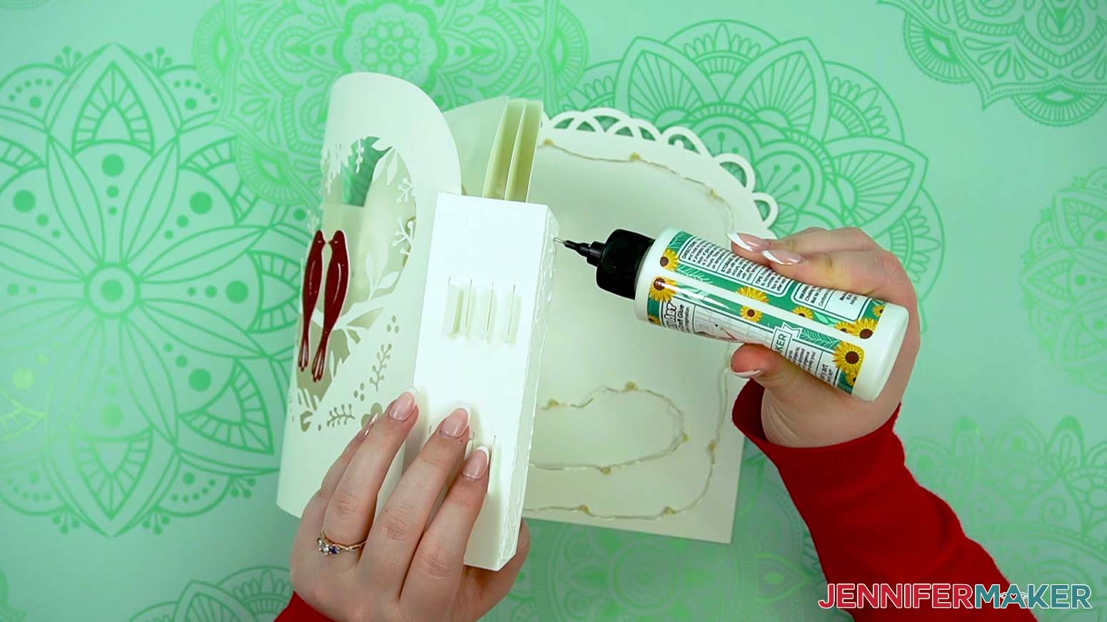 Add glue to the second tab for the back of the love paper lantern