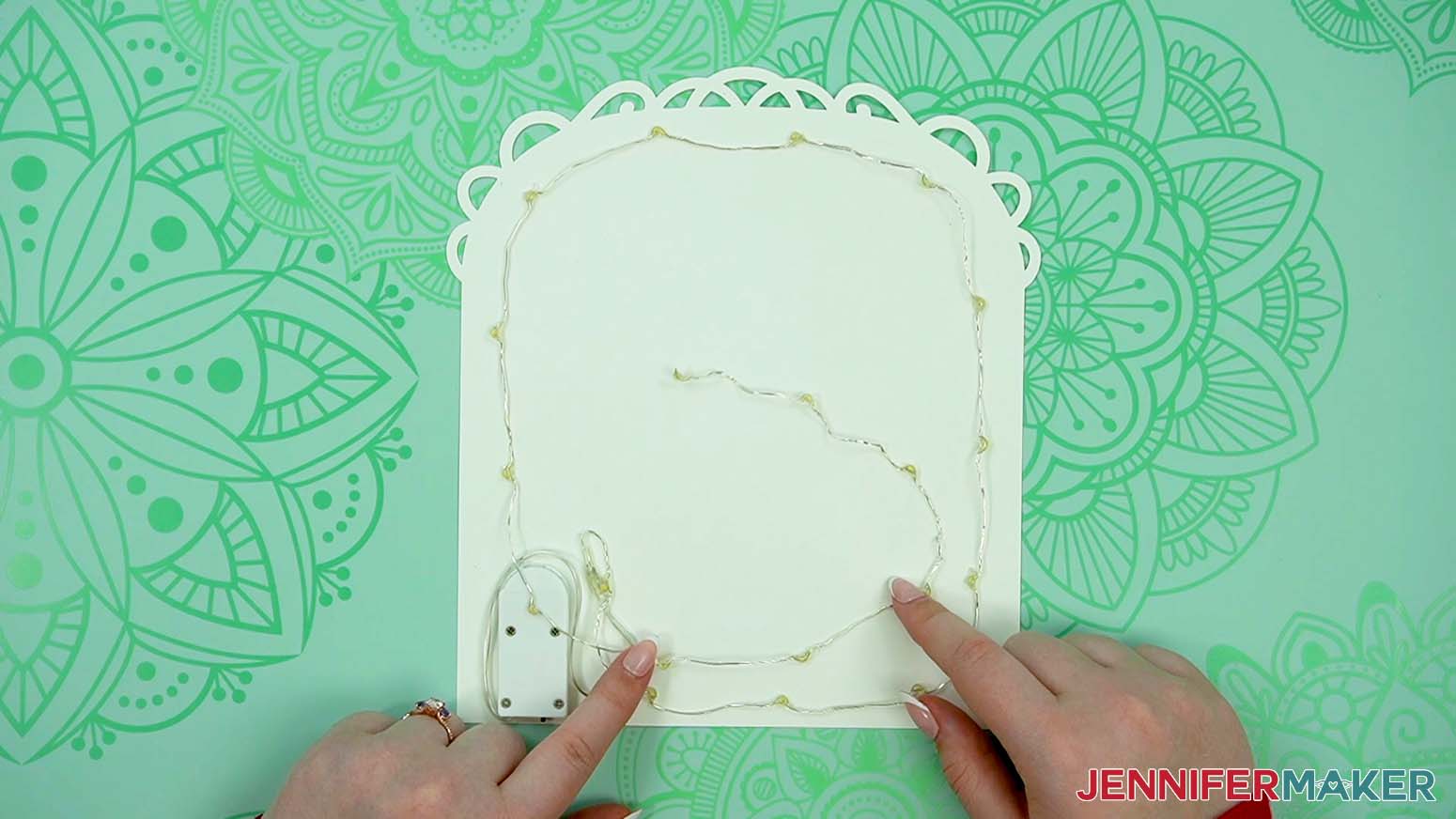 Keep the fairy lights away from the battery pack on the back piece of the love paper lantern