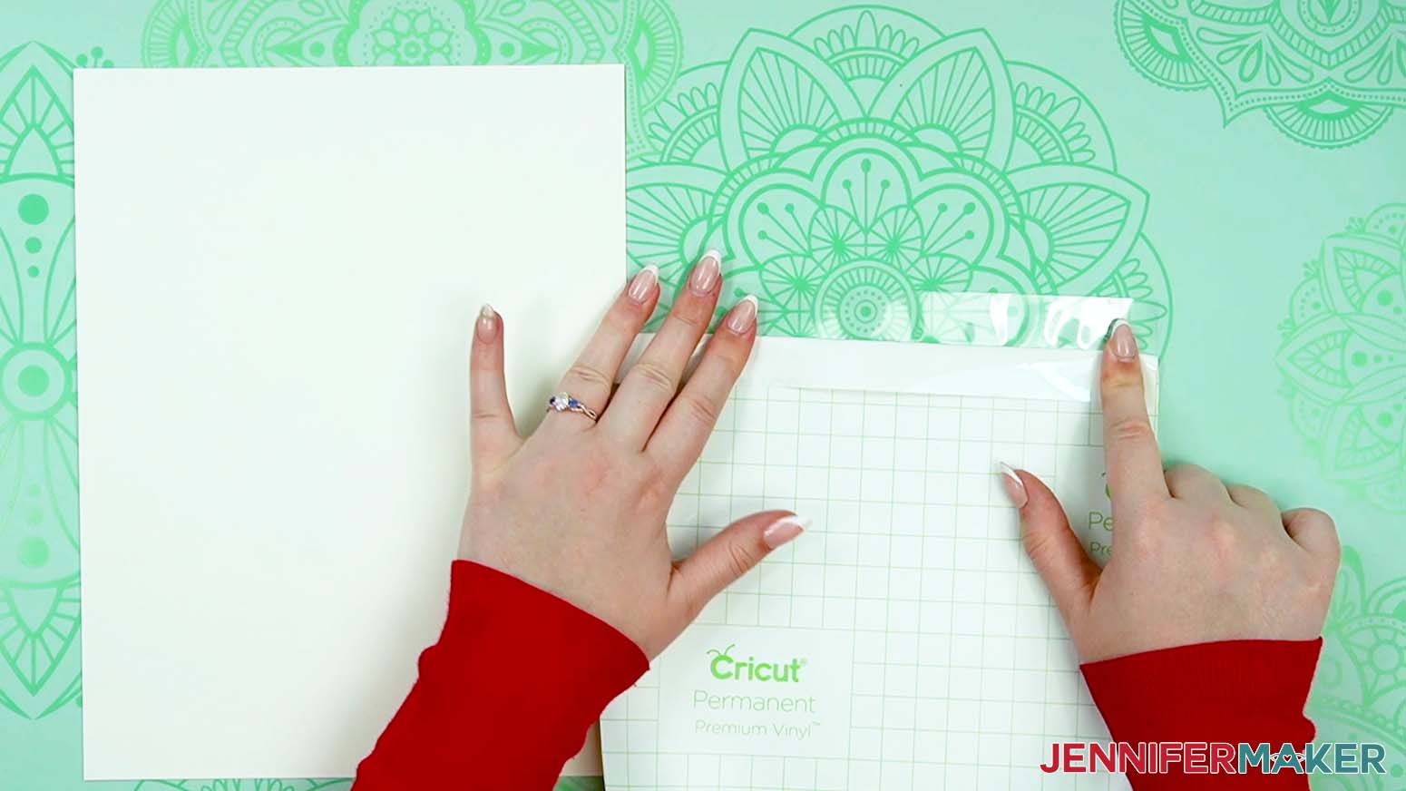 Peel back the edge of the vinyl backing before applying it to the cardstock to make a love paper lantern