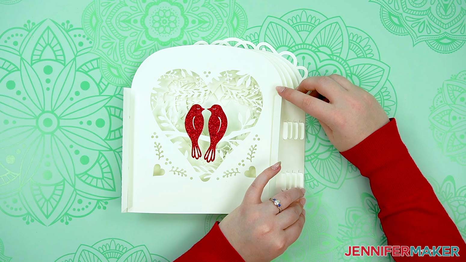 Press the second glued tab in place on the back of the love paper lantern