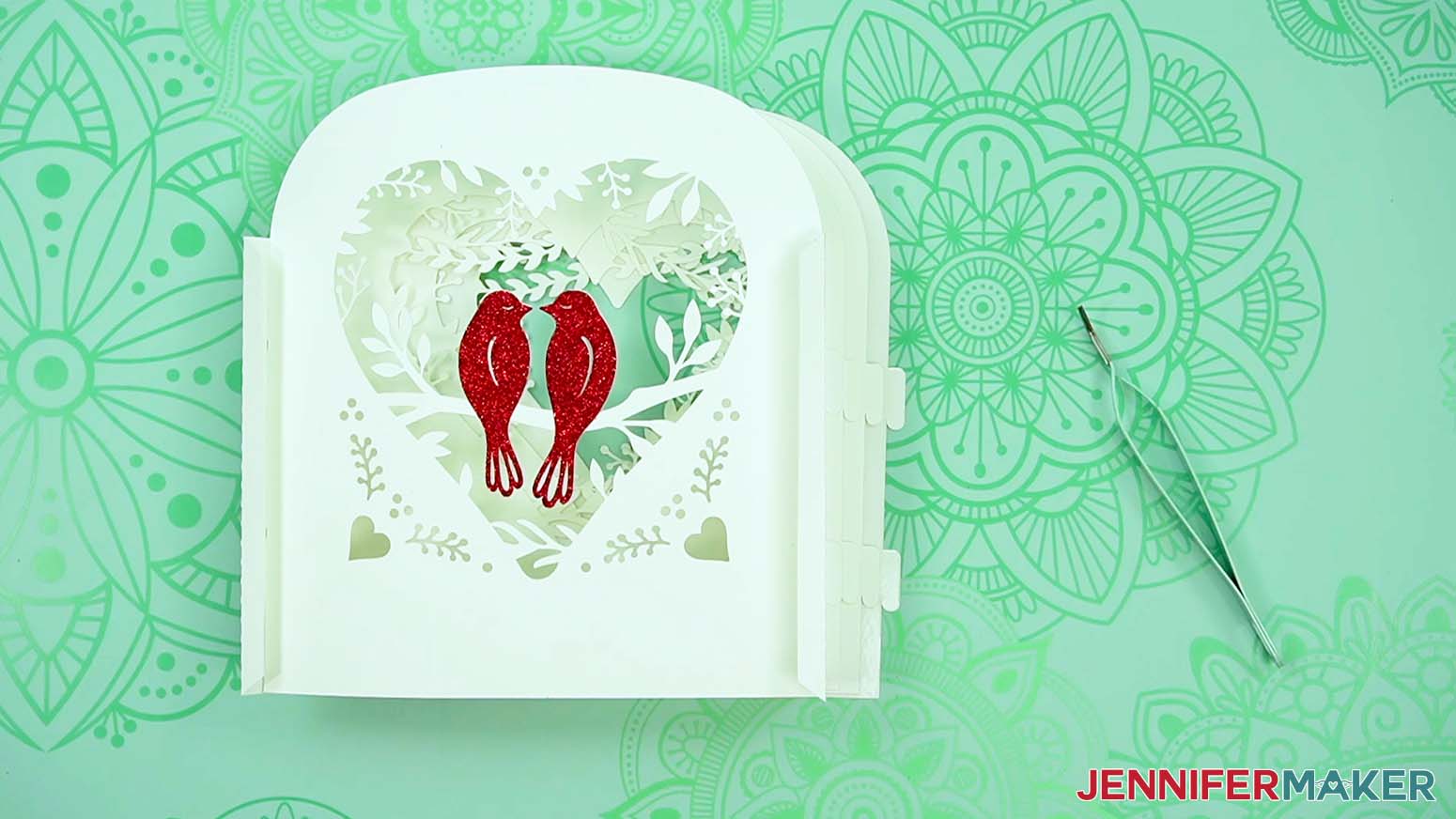 Slot the tabs for the second side into place to make a love paper lantern