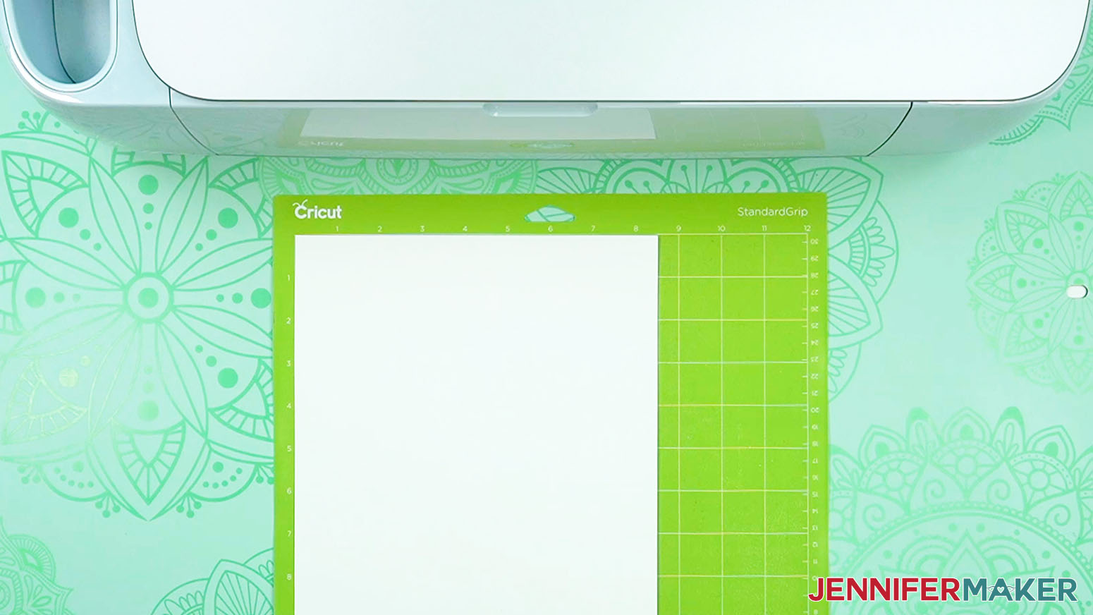 Apply the cardstock with vinyl on the back to a green machine mat to make a love paper lantern