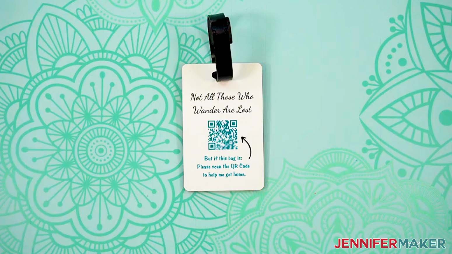 The finished dye sublimation luggage tagg is QR Code design face up on a table.