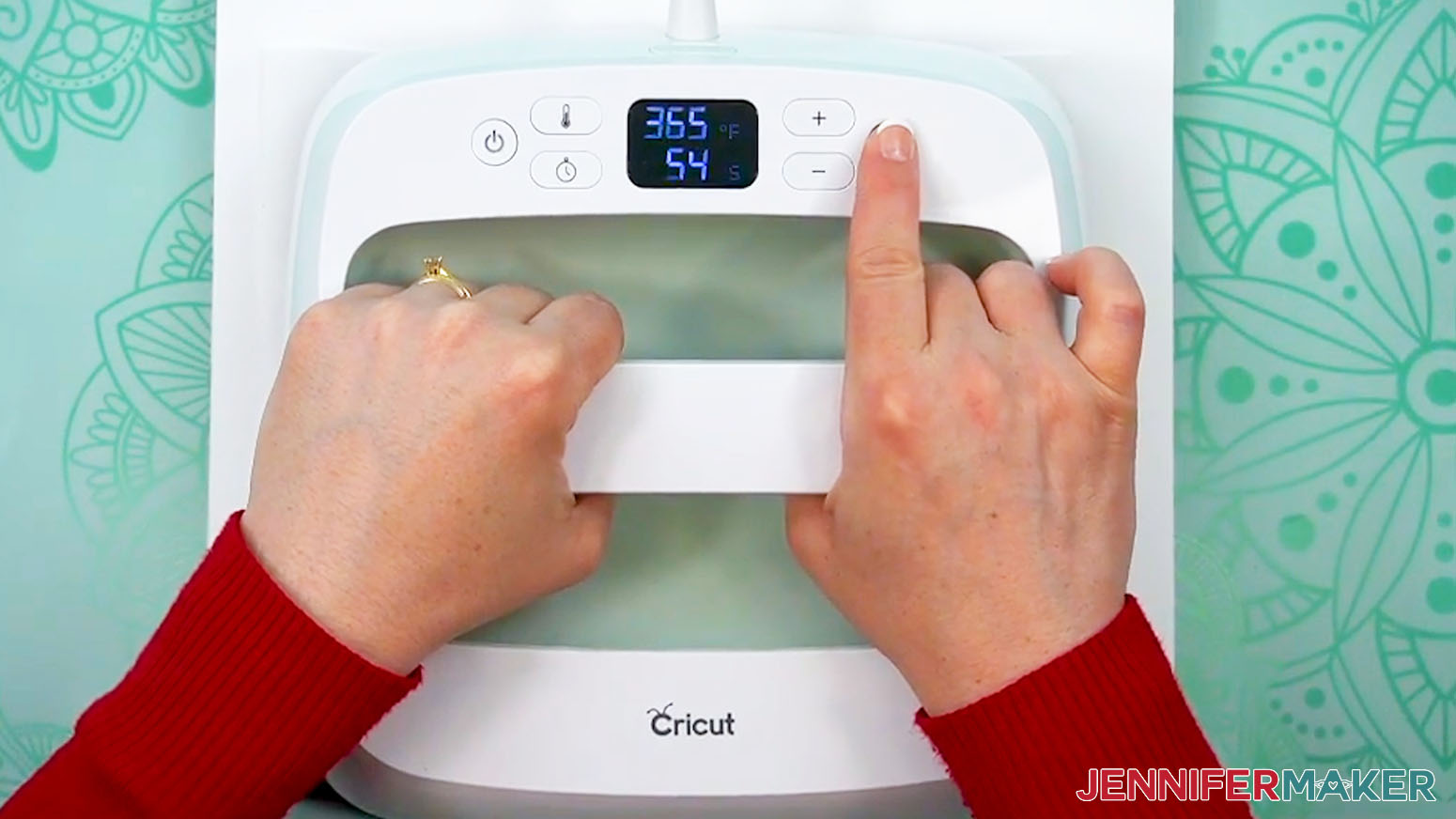 The Easy Press is being pressed down to evenly distribute pressure.