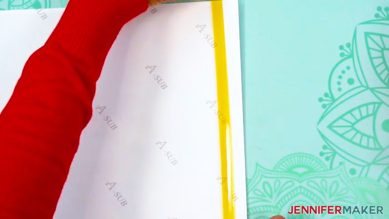 Place a piece of tape along the back of one side edge of the sublimation tumbler design.