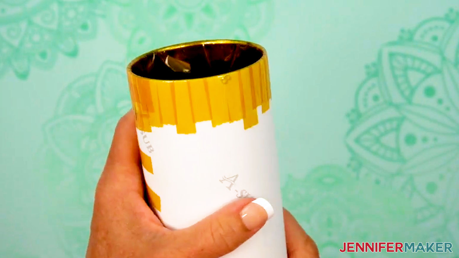 Secure the top end of the sublimation design tumbler to the tumbler with tape pressed into the tumbler all around the upper edge.