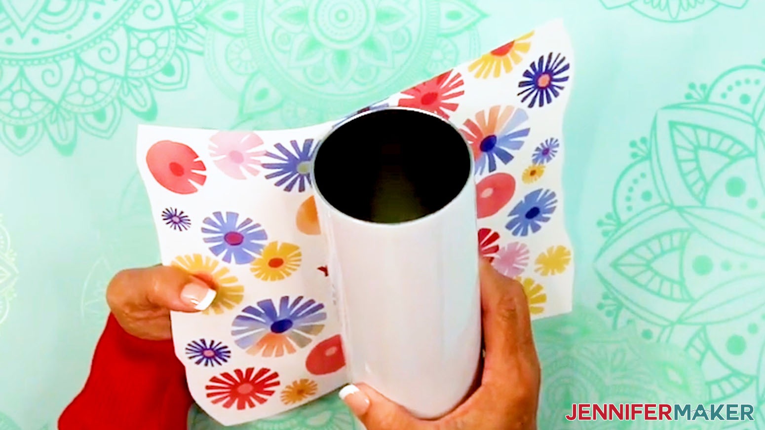 Align the edges of the wrap design around the sublimation tumbler.