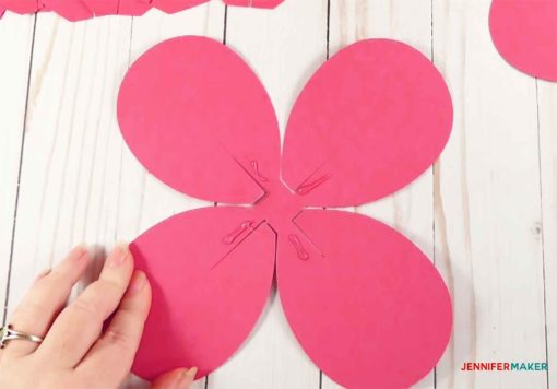 Glue the bottom edges of each petal to make giant paper flowers