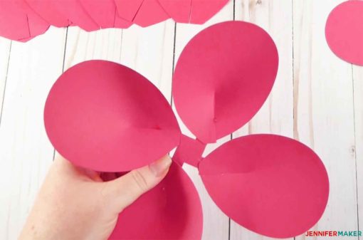 A cupped petal group in pink to make giant paper flowers