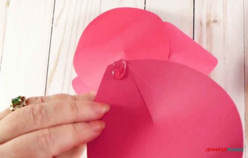 Glue at the base of the petal to make giant paper flowers