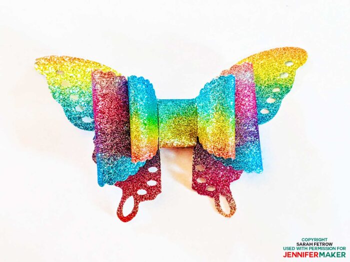 Rainbow faux leather butterfly hair bow cut on a Cricut by Sarah Fetrow (photo used with permission)