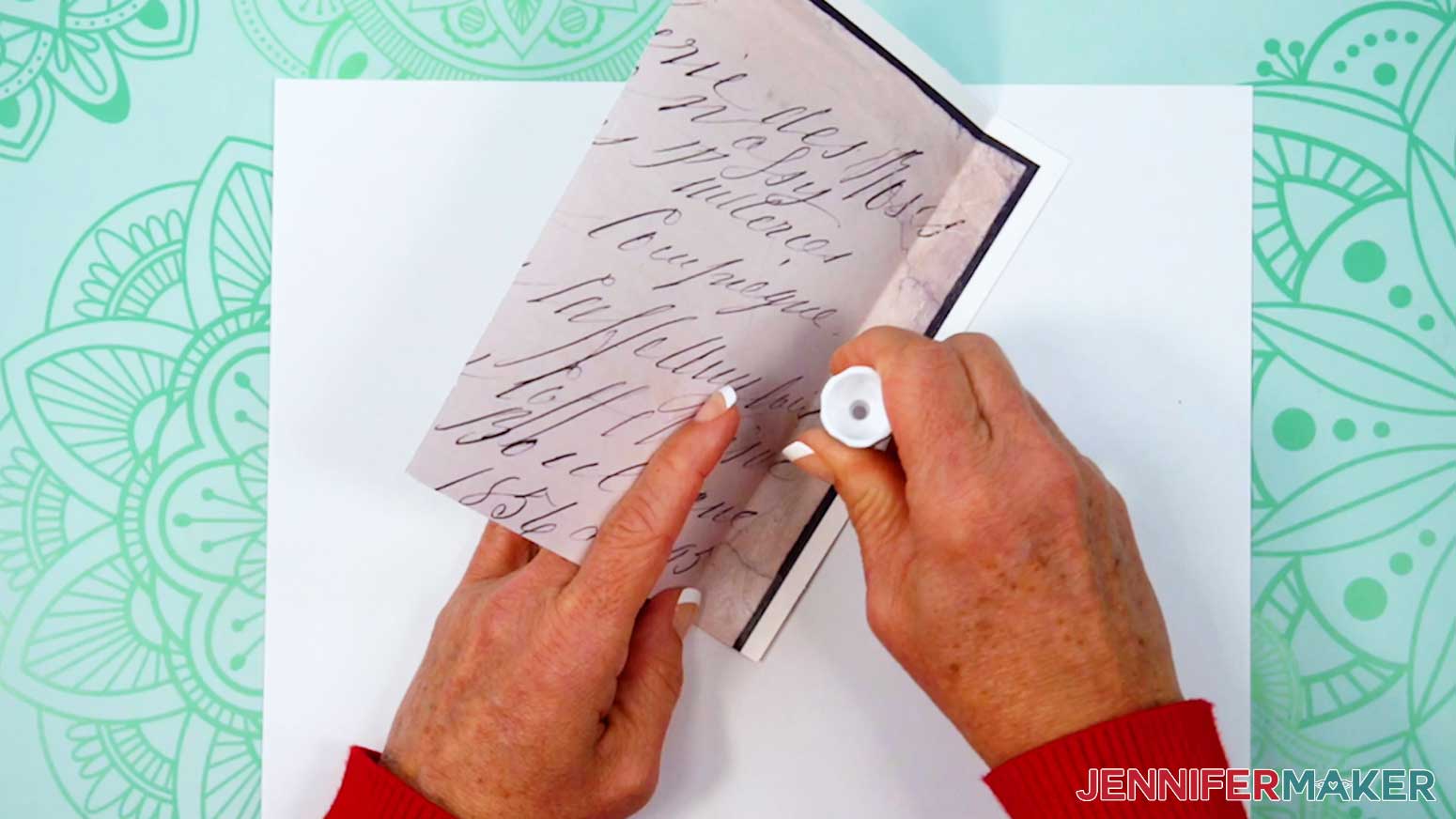 Add glue to the edge of the tab of the printed page for the Junk Journal.