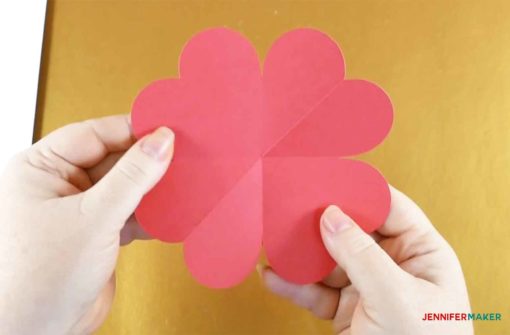 A scored and folded heart piece ready to make the pop-up heart card