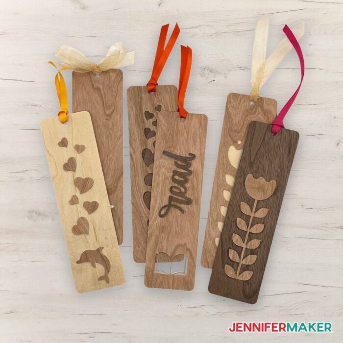 Wooden bookmarks in walnut, cherry, and maple wood veneers with hearts, flowers, books, and dolphins