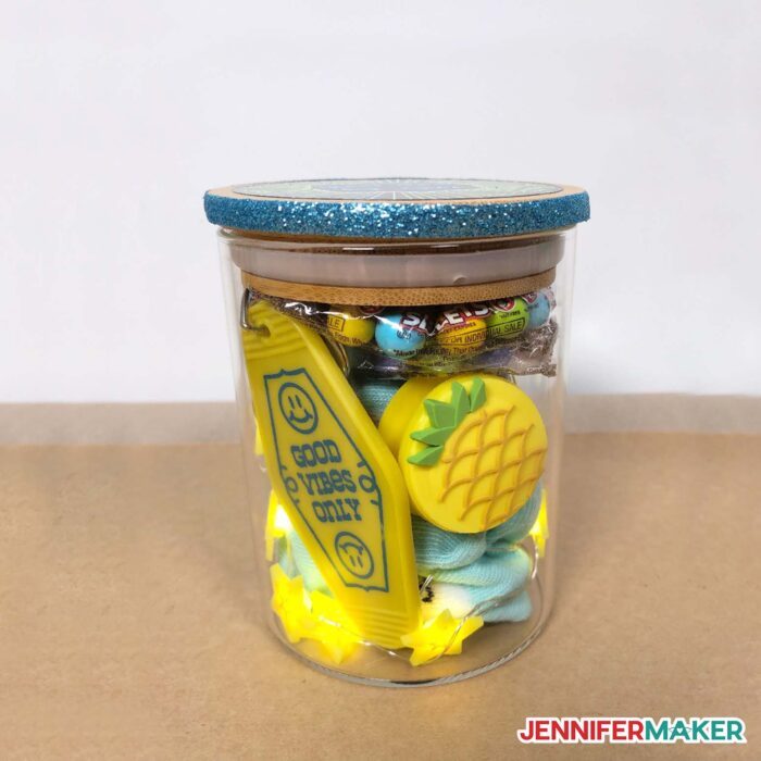 Glass container filled toys from mason jar gift ideas tutorial.