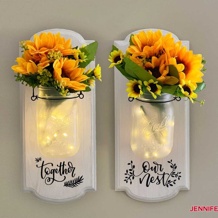 https://jennifermaker.com/wp-content/uploads/mason-jar-sconces-finished-set-720x720.jpg